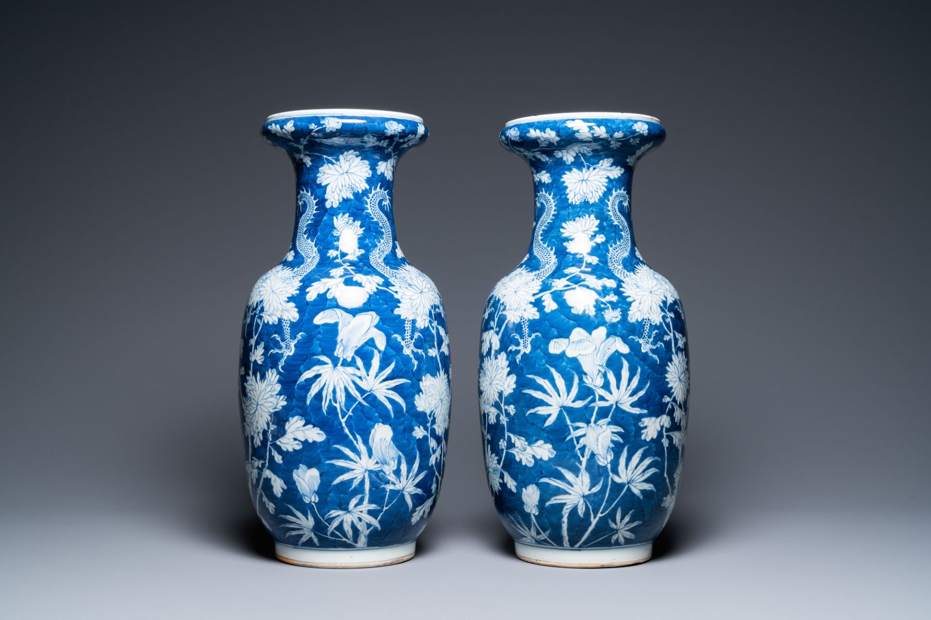A pair of Chinese blue and white 'dragon and peony' vases, 19th C. - Image 3 of 21