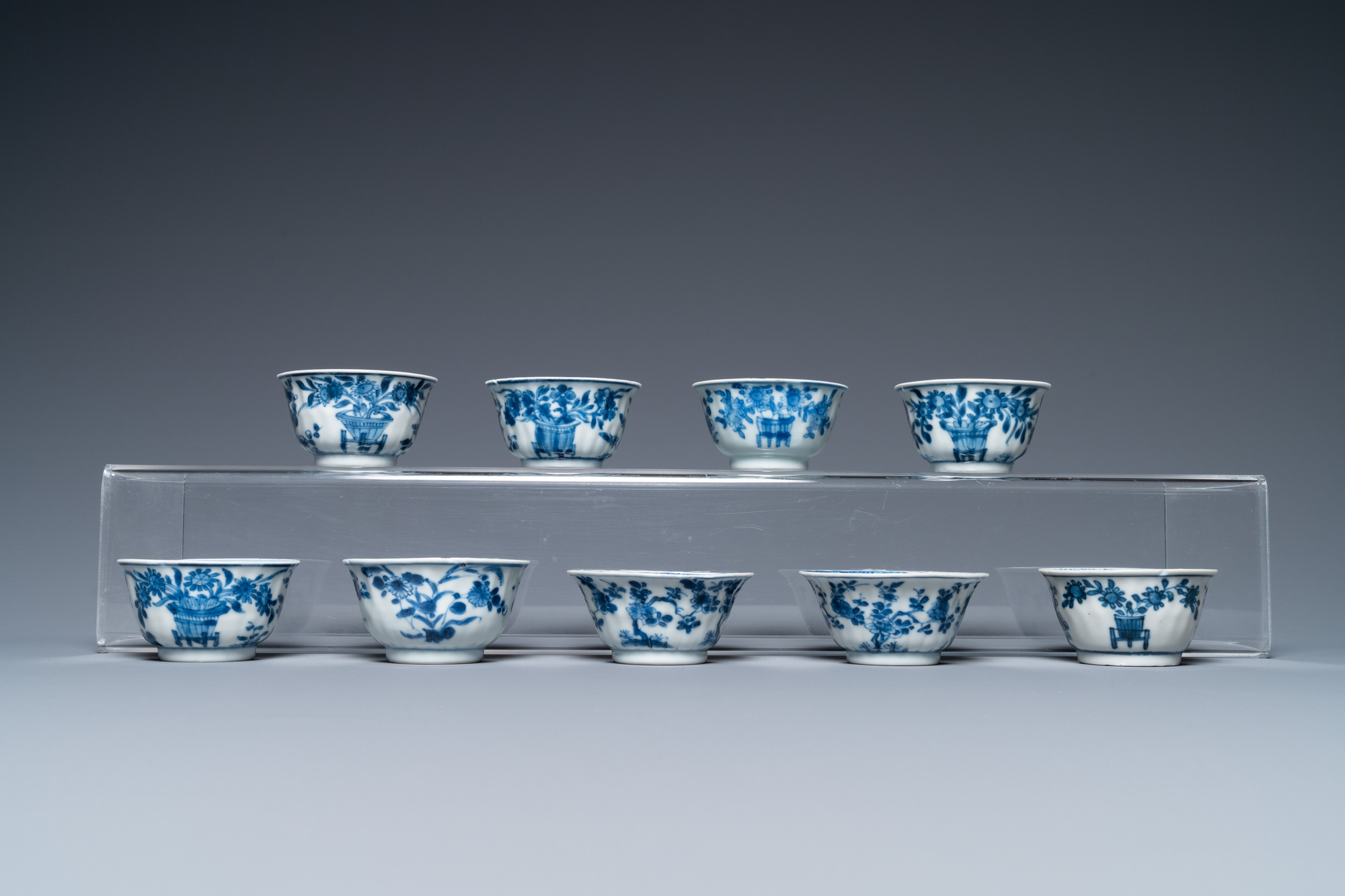 Ten Chinese blue and white saucers and nine cups, Kangxi - Image 4 of 11