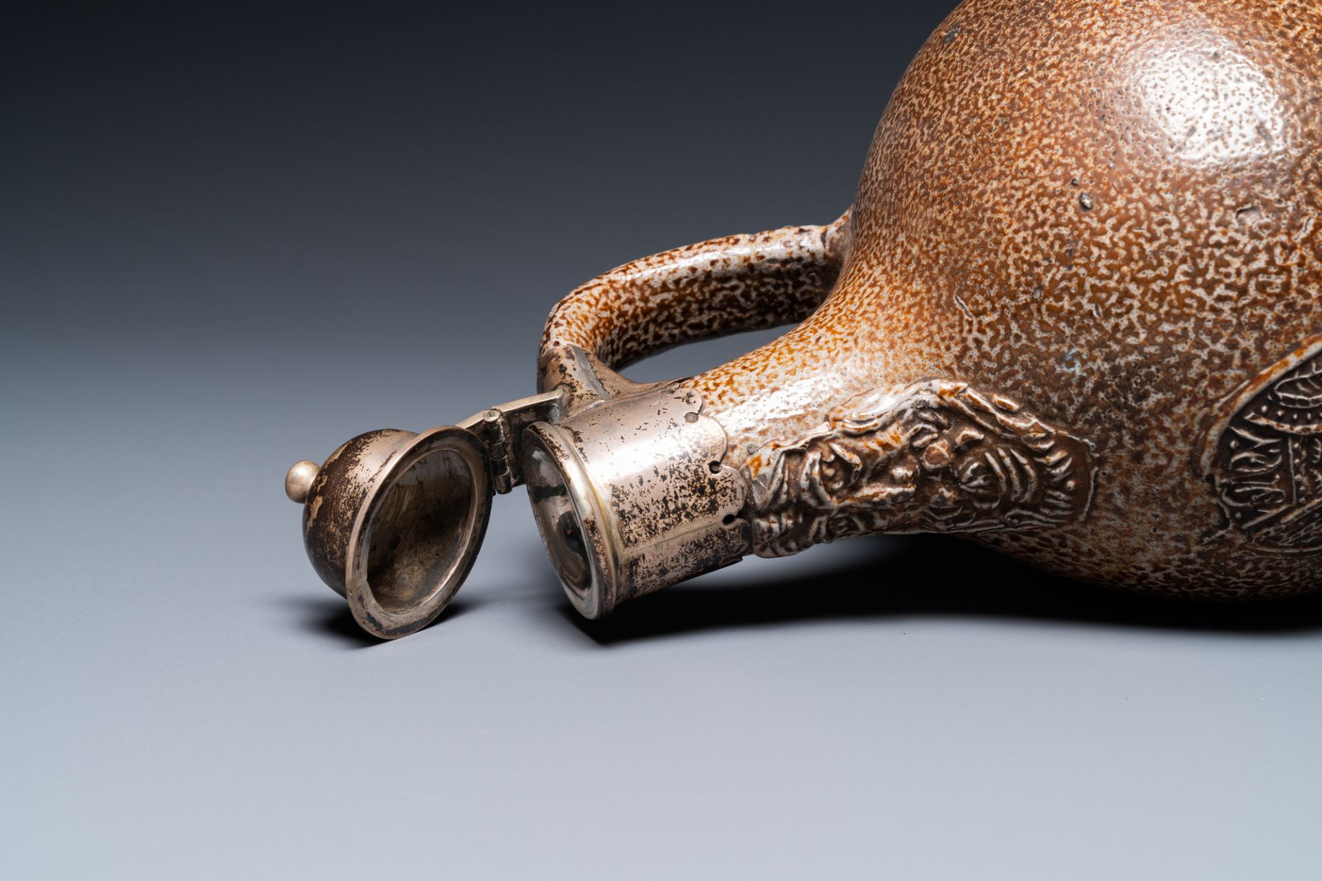 An English silver-mounted stoneware bellarmine jug, Raeren, 17th C. - Image 8 of 9