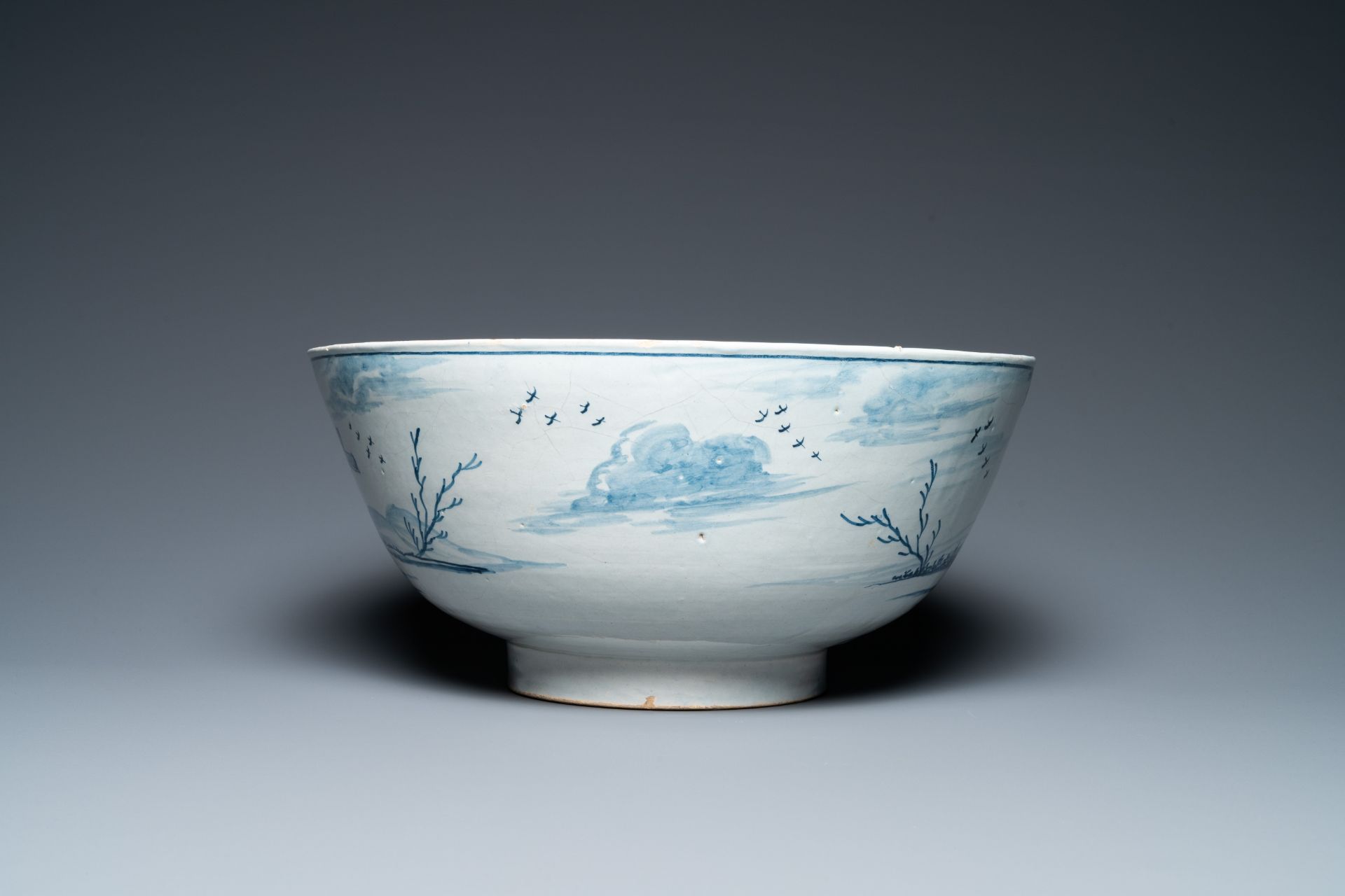 A large Dutch Delft blue and white bowl with shepherds on horsebacks, 18th C. - Image 5 of 9