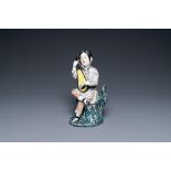 A Chinese famille rose figure of a musician, Fu Jian Hui Guan mark, Republic