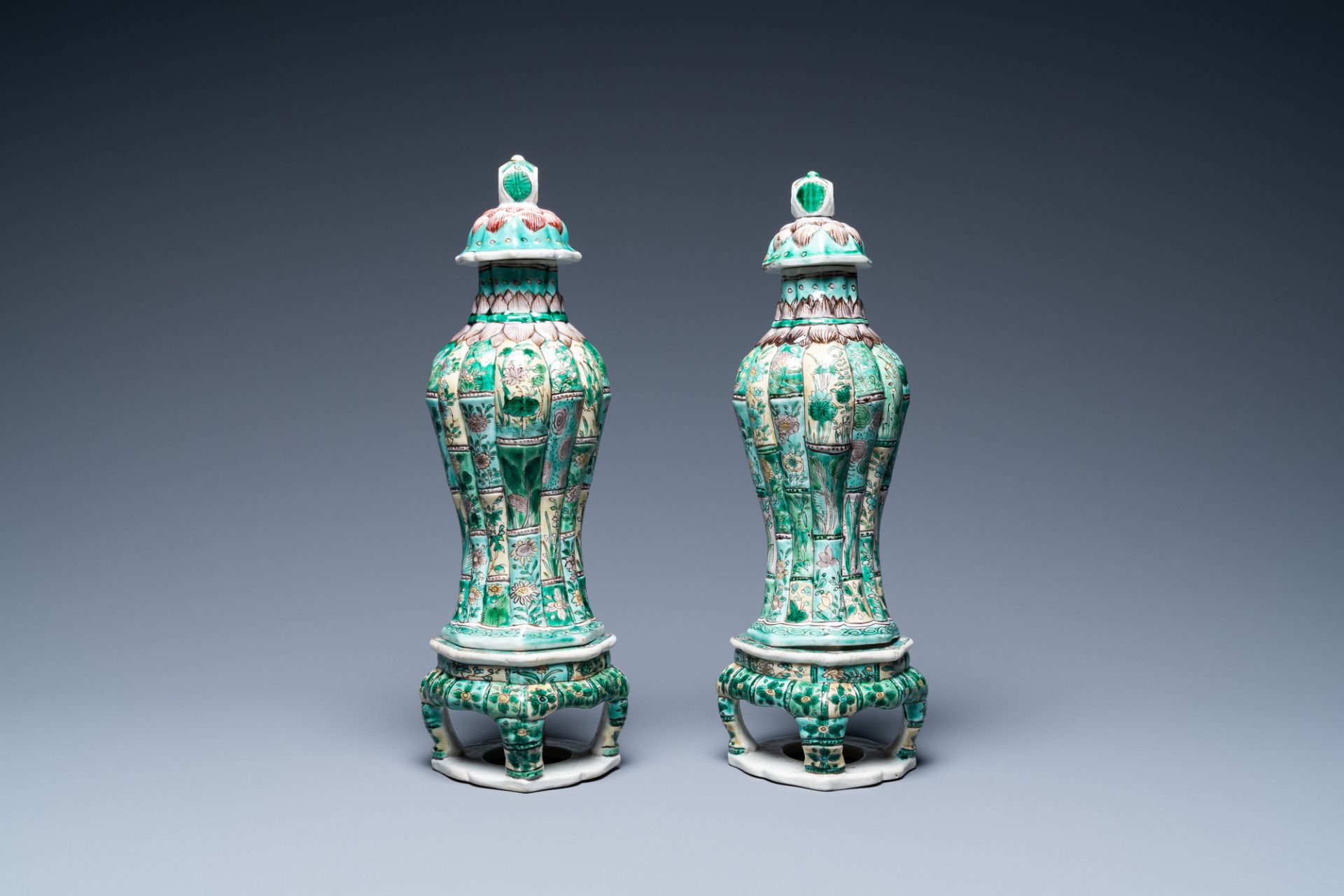 A pair of Chinese verte biscuit vases and covers on stands, Kangxi - Image 4 of 6