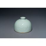 A Chinese celadon-glazed water pot, Kangxi mark, 19th C.