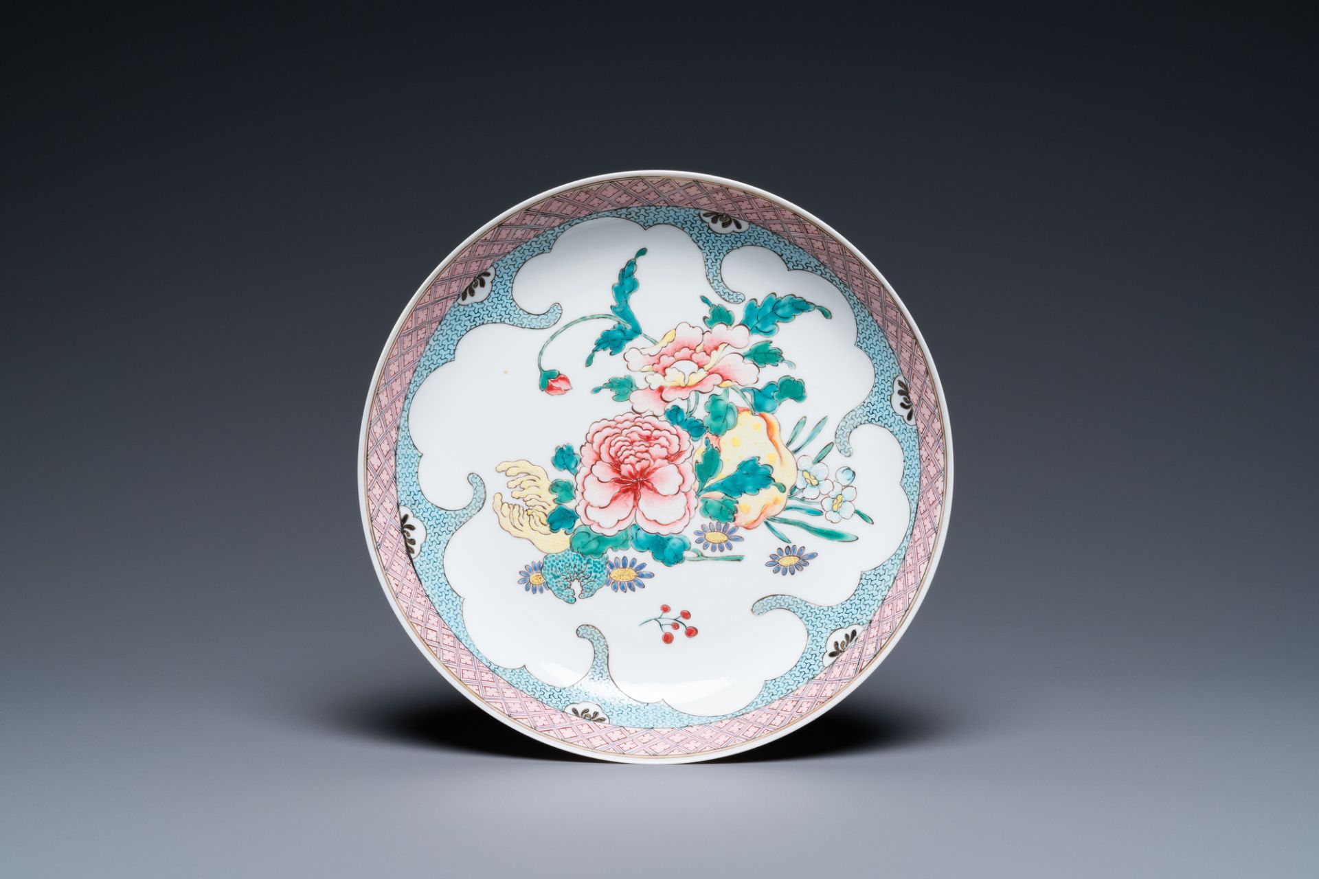 A Chinese famille rose eggshell porcelain 'peony and fingered citron' plate, Yongzheng