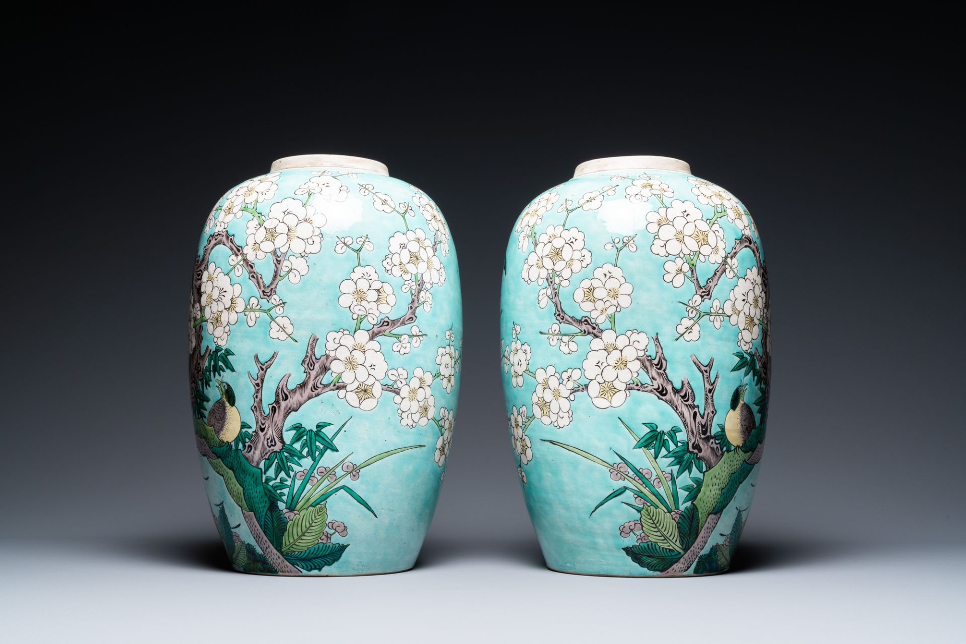 A pair of Chinese verte biscuit turquoise-ground jars, 19th C. - Image 2 of 6