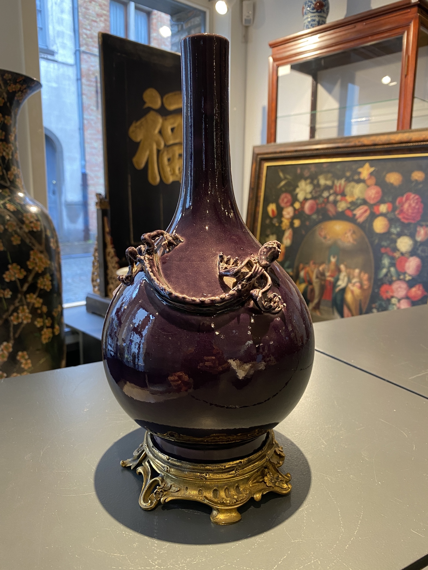 A Chinese monochrome aubergine-glazed bottle vase with gilt bronze mounts, Qianlong mark, 19/20th C. - Image 8 of 11