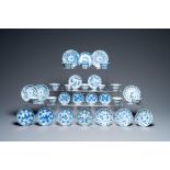 Nineteen Chinese blue and white saucers and twelve cups, Kangxi
