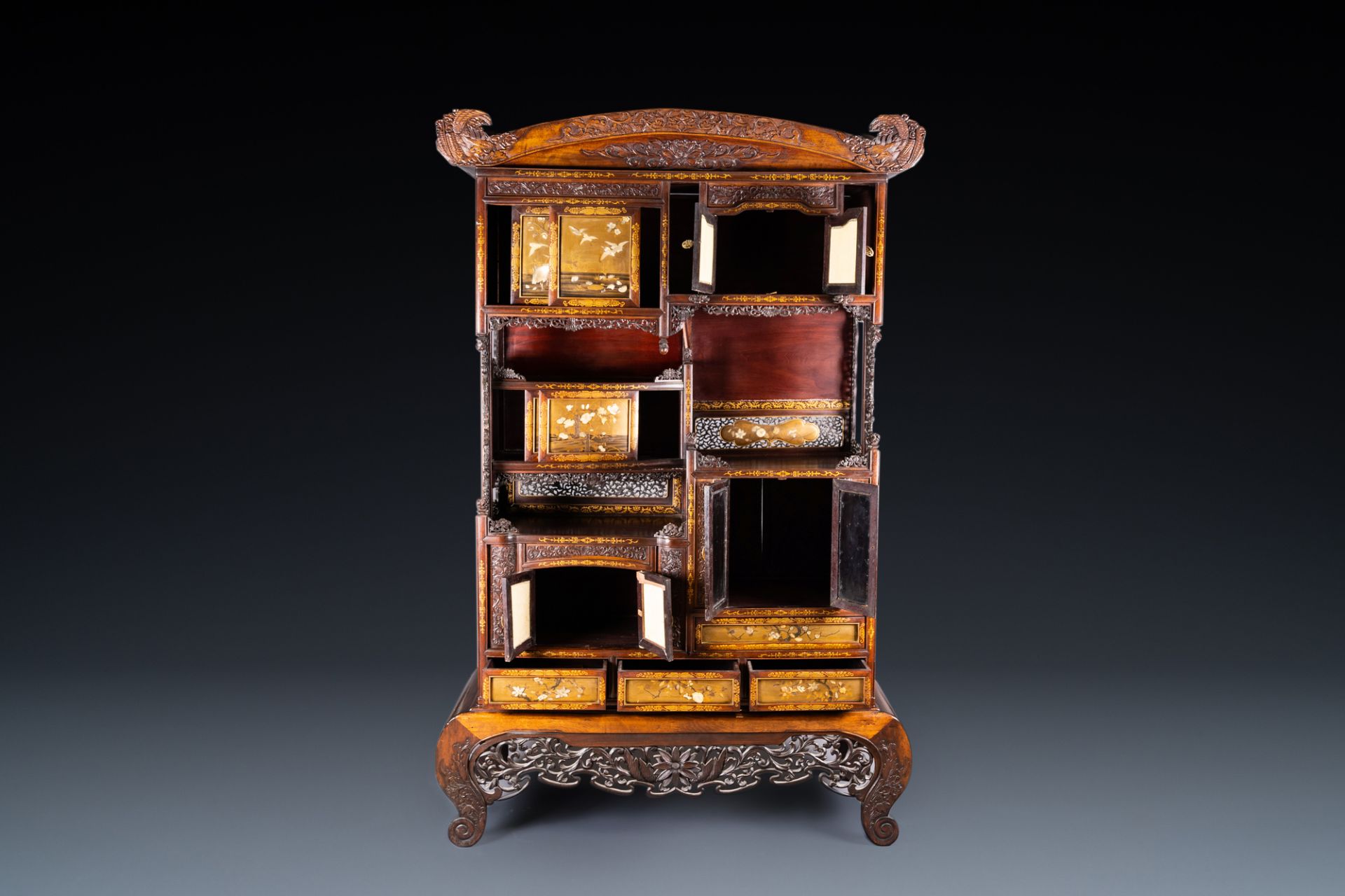 A Japanese 'chigaidansu' gilt-lacquered wood cabinet with finely carved ivory insets, Meiji, 19th C. - Image 2 of 15
