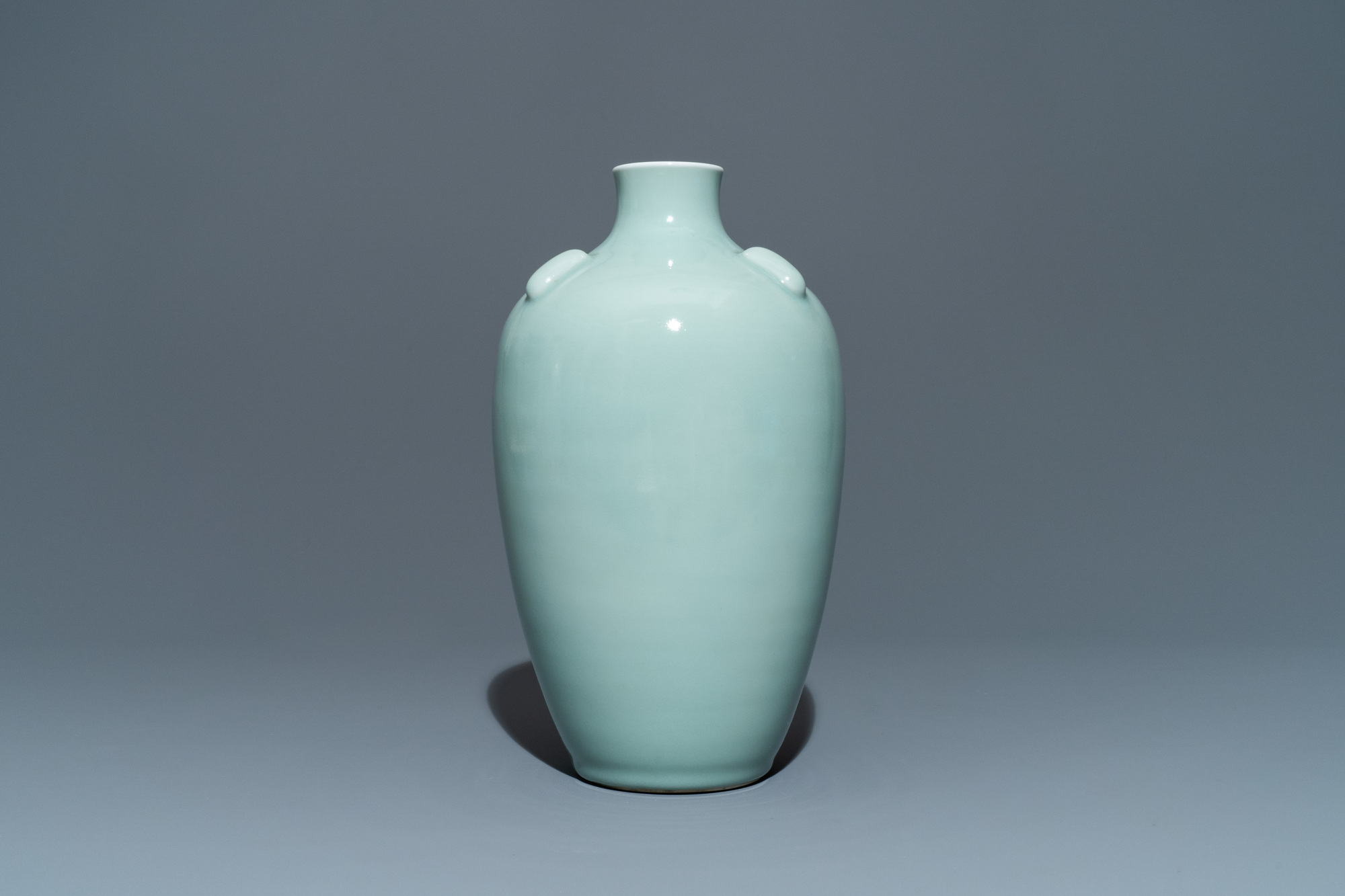 A Chinese monochrome celadon-glazed vase, Qianlong mark, 19/20th C.