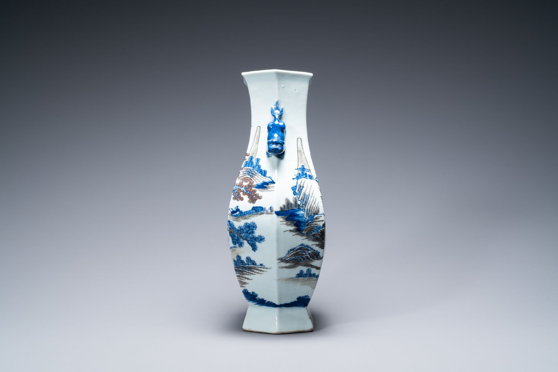 A Chinese blue, white and copper-red 'mountainous landscape' vase, 19th C. - Image 2 of 6