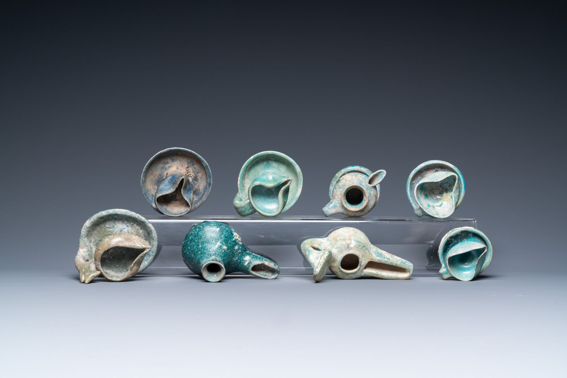 Eight turquoise-glazed oil lamps, Middle-East, 13th C. and later - Image 6 of 7