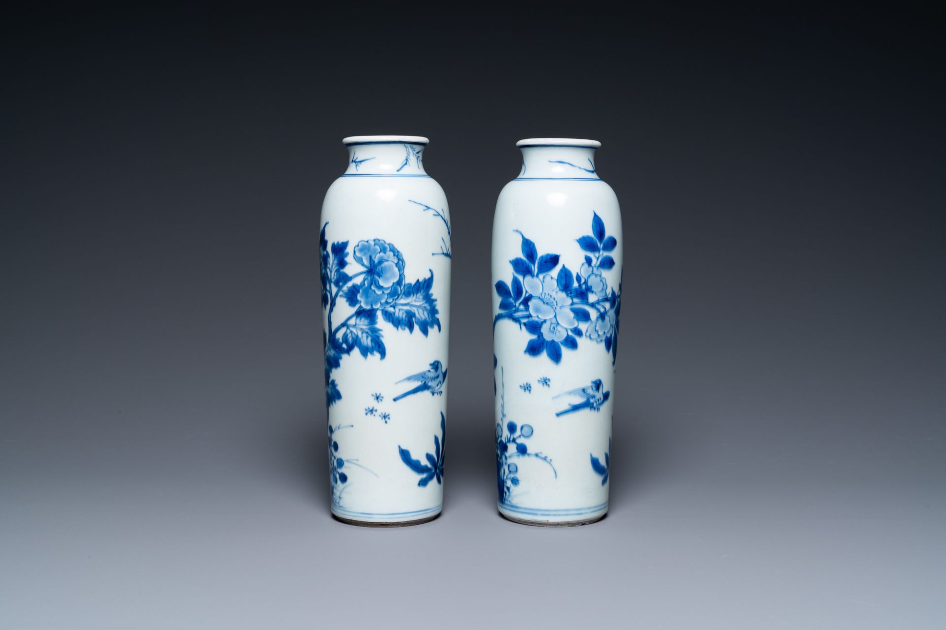 A pair of Chinese blue and white rouleau vases with birds among blossoming branches, Transitional pe - Image 3 of 6