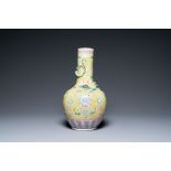 A Chinese yellow-ground famille rose bottle vase, 19th C.