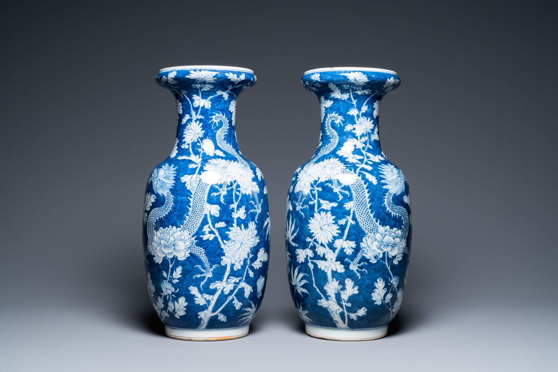 A pair of Chinese blue and white 'dragon and peony' vases, 19th C. - Image 2 of 21