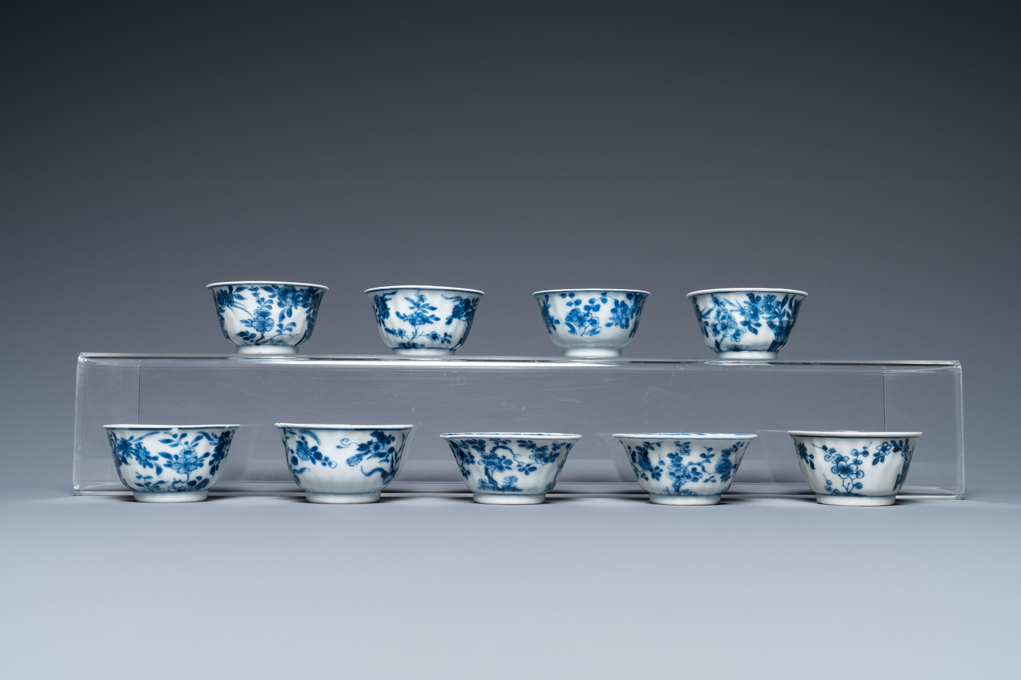 Ten Chinese blue and white saucers and nine cups, Kangxi - Image 7 of 11