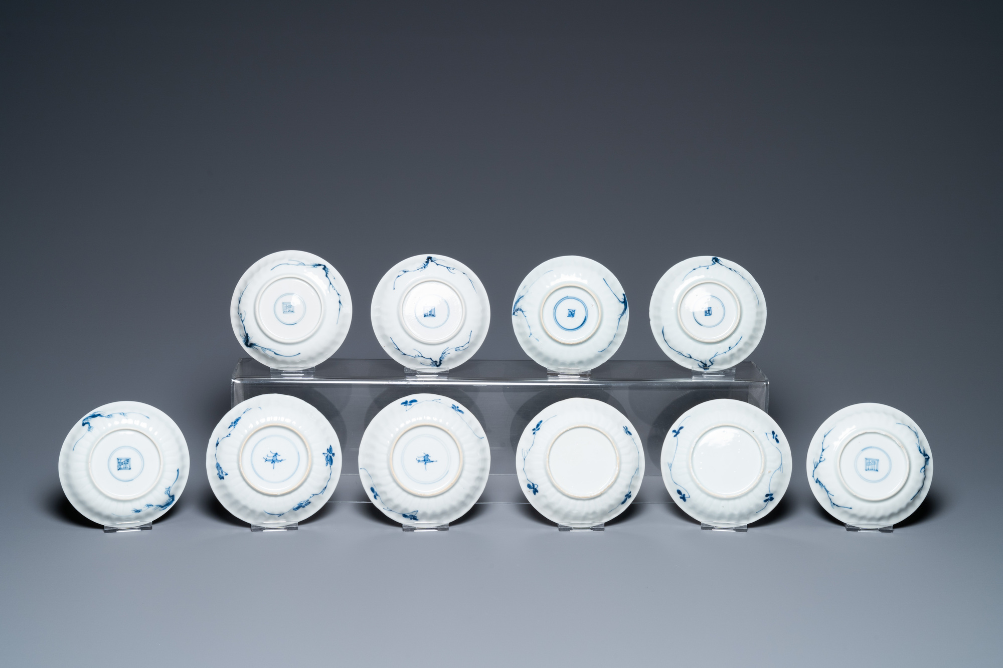 Ten Chinese blue and white saucers and nine cups, Kangxi - Image 3 of 11
