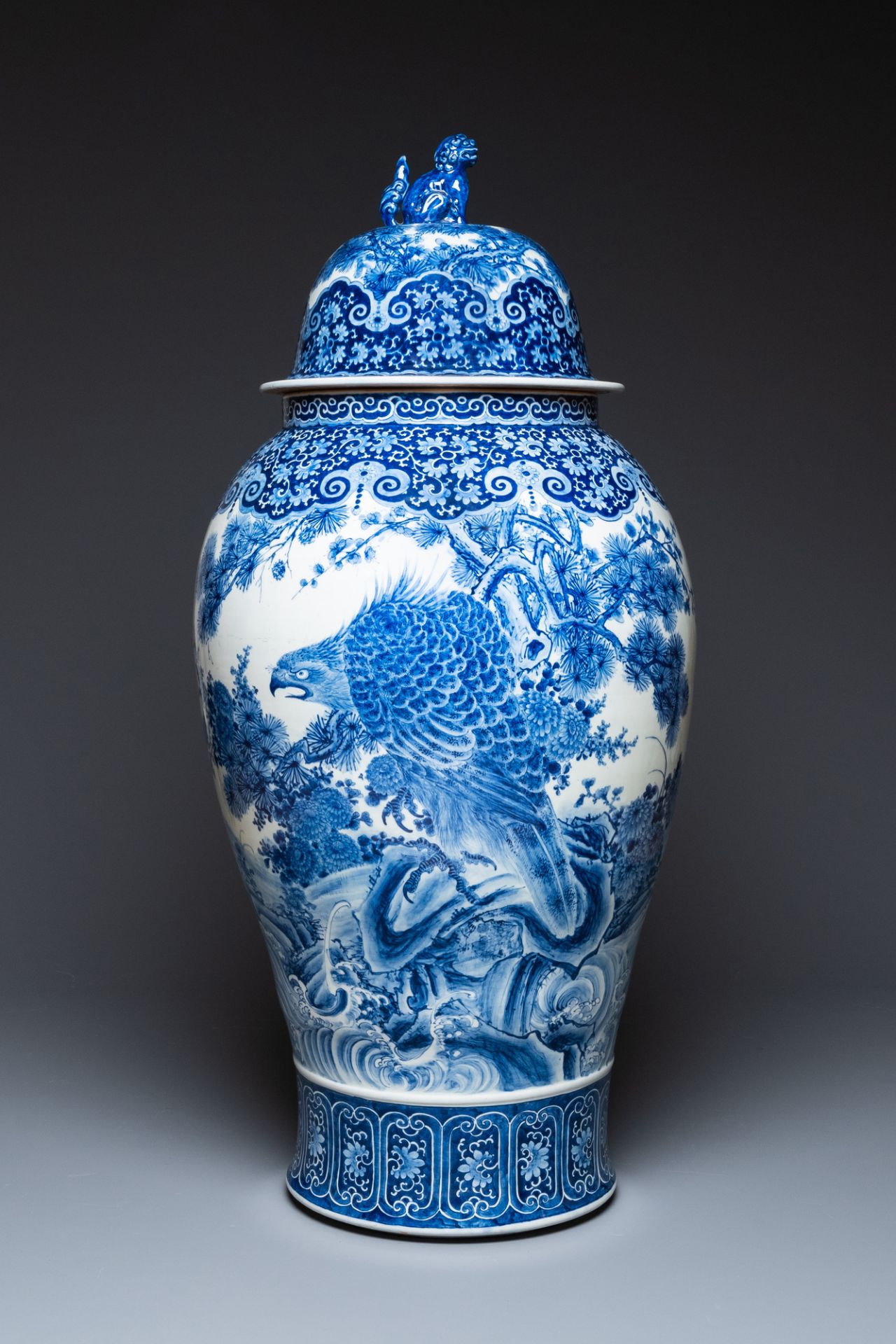 A massive Japanese blue and white Seto vase and cover with shishi and an eagle, Meiji, 19th C. - Image 3 of 6