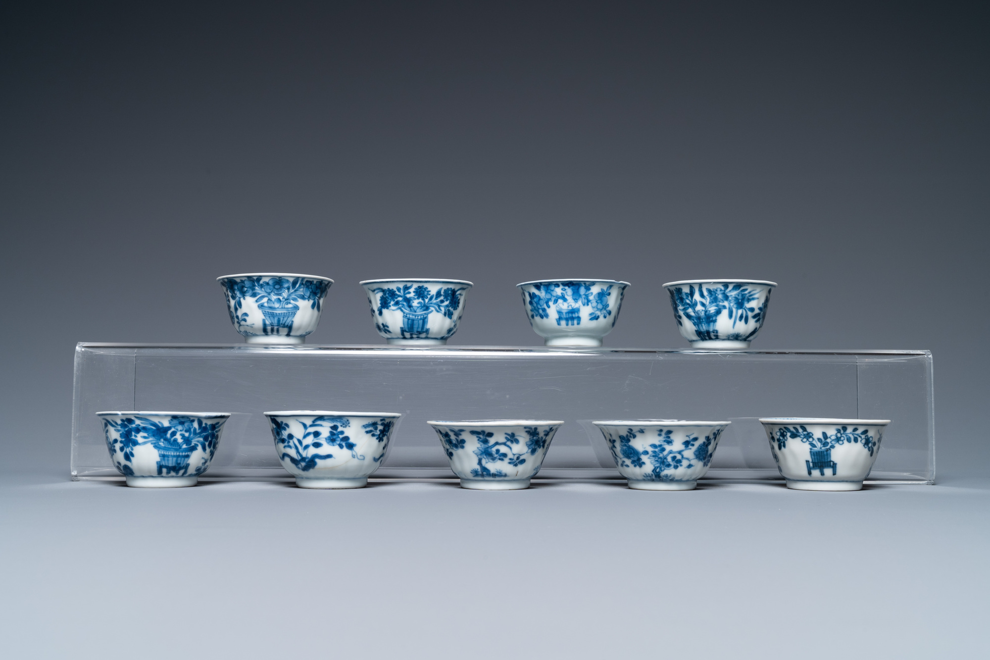 Ten Chinese blue and white saucers and nine cups, Kangxi - Image 6 of 11