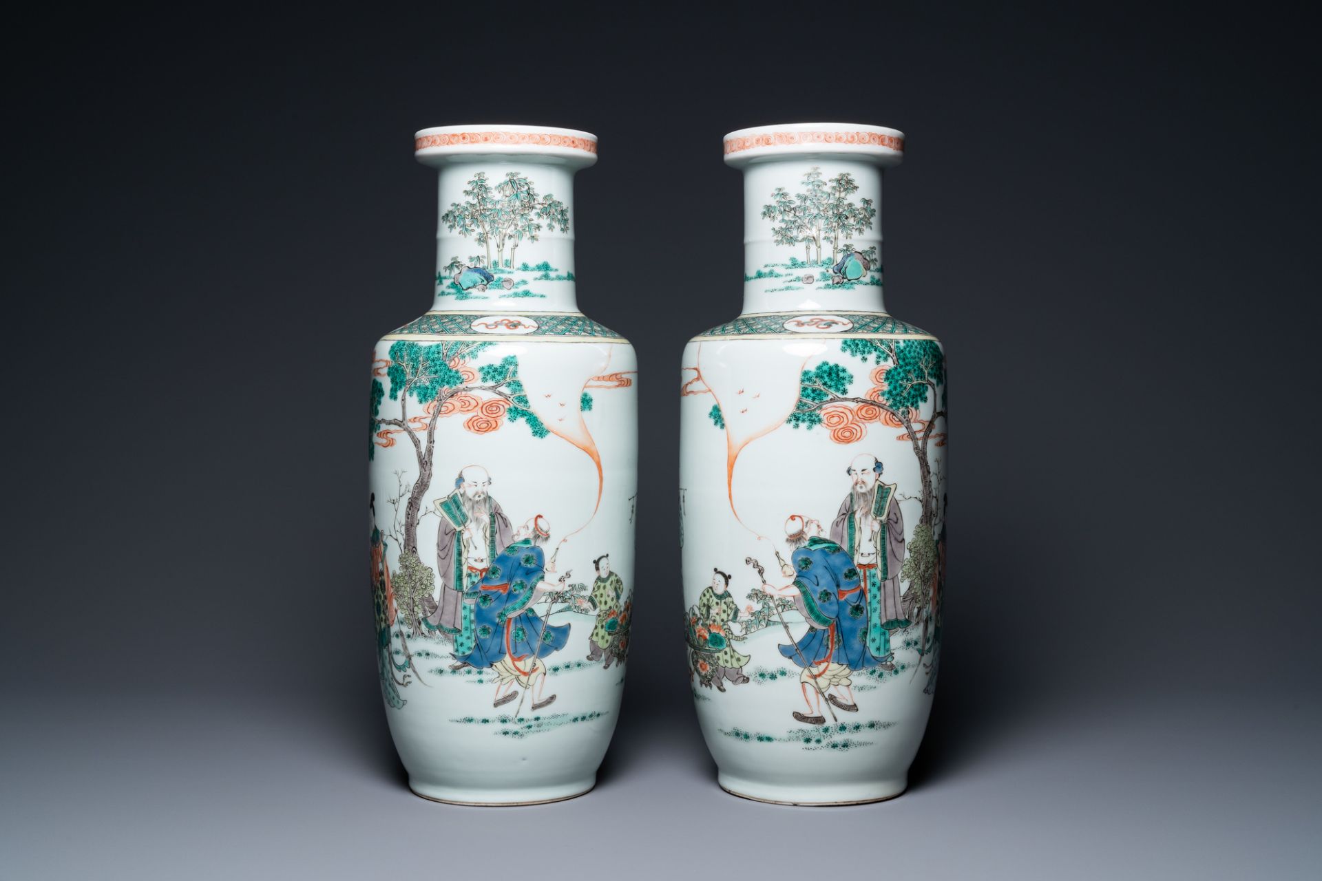 A pair of Chinese famille verte rouleau vases, Kangxi mark, 19th C.