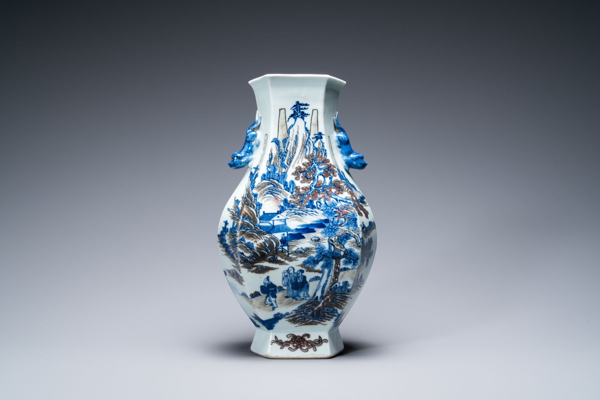 A Chinese blue, white and copper-red 'mountainous landscape' vase, 19th C. - Image 3 of 6