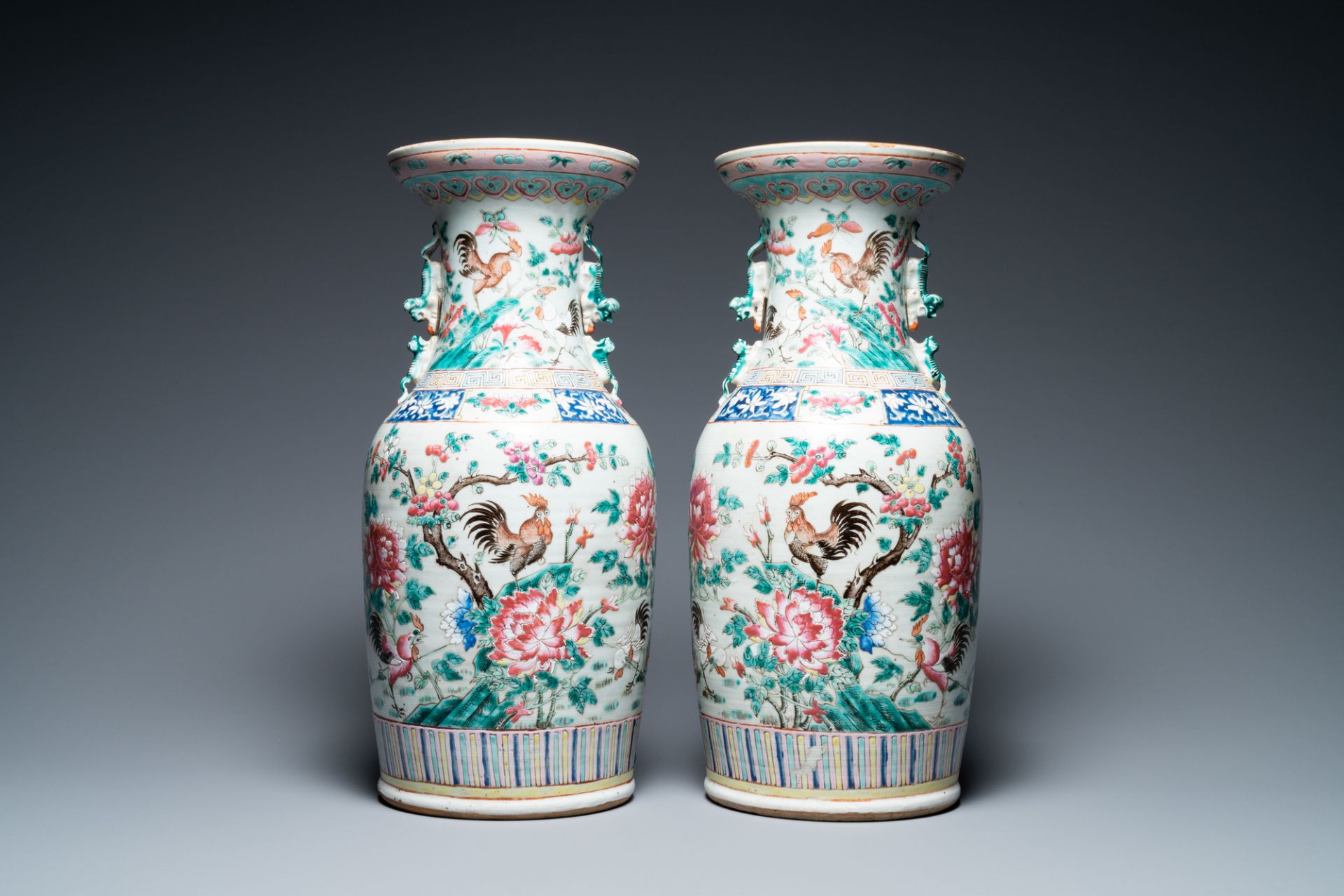 A pair of Chinese famille rose 'rooster' vases, 19th C.