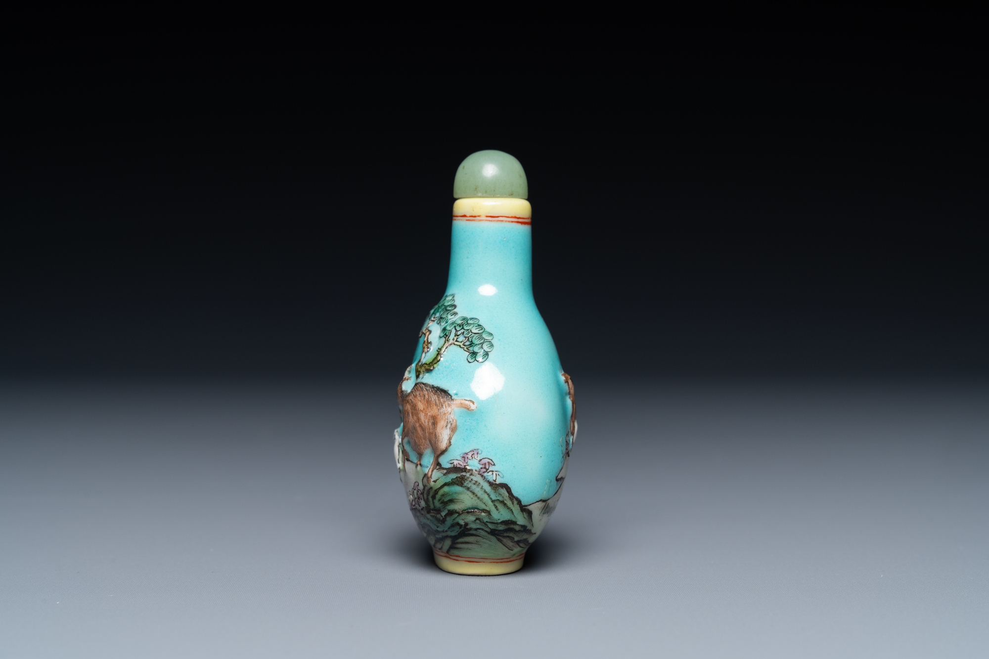 A Chinese relief-molded snuff bottle depicting goats, Yang He Tang mark, 19/20th C. - Image 2 of 8