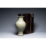 A ribbed Chinese Longquan celadon vase, Ming