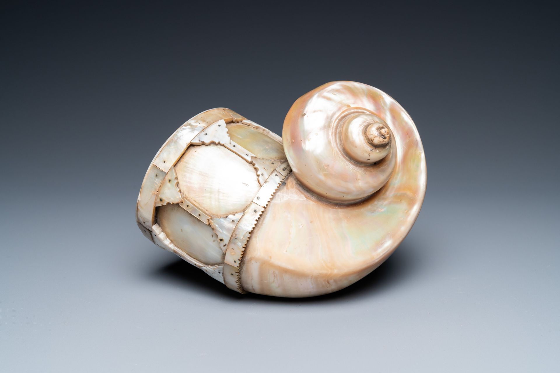 An Indo-Portuguese mother-of-pearl and nautilus shell powder horn, Gujarat, India, 17/18th C. - Image 2 of 9