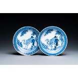 A pair of Japanese blue and white Arita saucer dishes with a Dutchman next to his camel, Edo, 17/18t