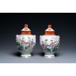 A pair of Chinese famille rose vases with reticulated covers, Qianlong mark, Republic