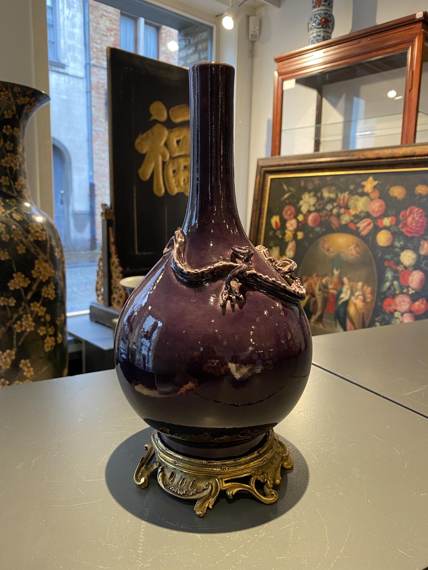 A Chinese monochrome aubergine-glazed bottle vase with gilt bronze mounts, Qianlong mark, 19/20th C. - Image 9 of 11