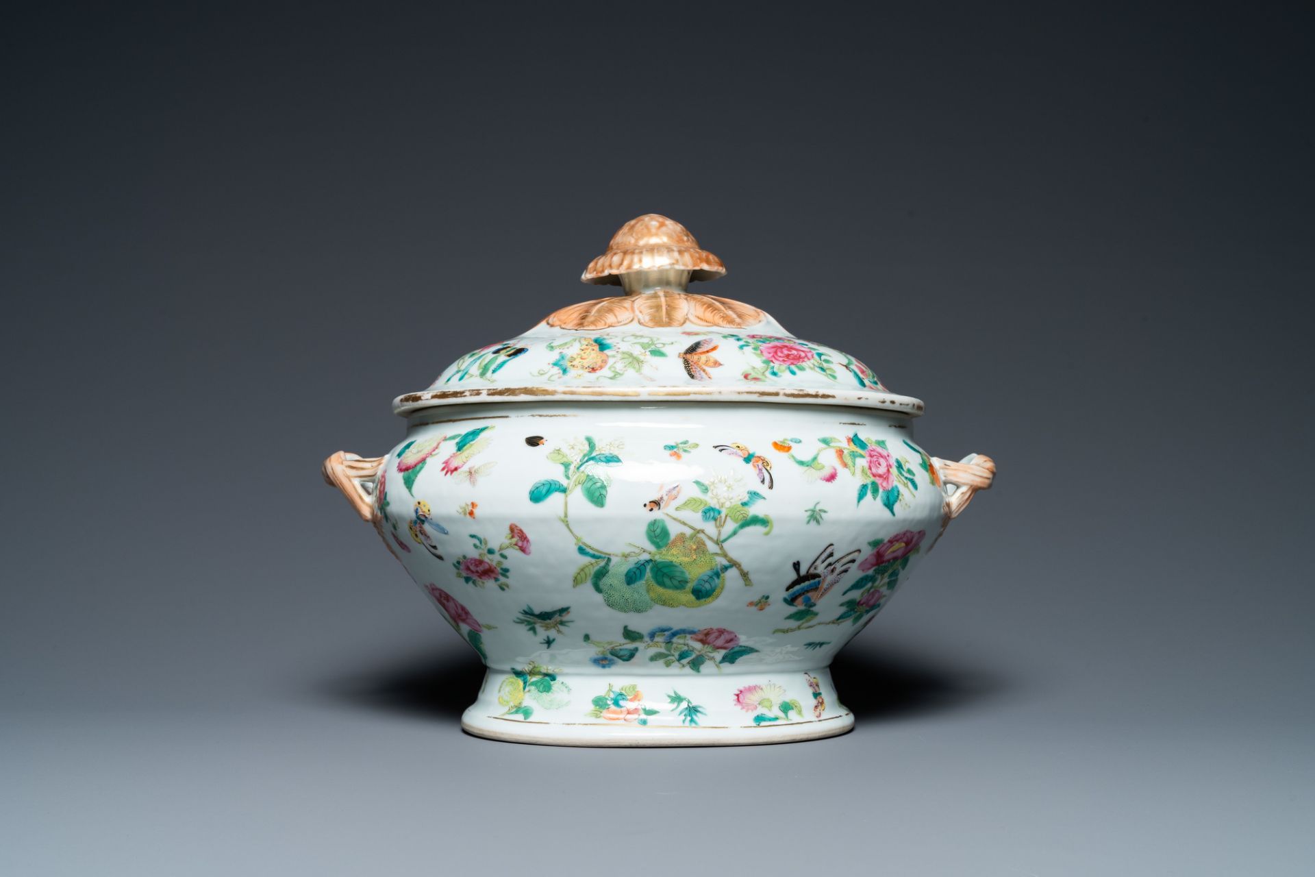 A Chinese Canton famille rose 'butterflies' tureen and cover on stand, 19th C. - Image 6 of 9
