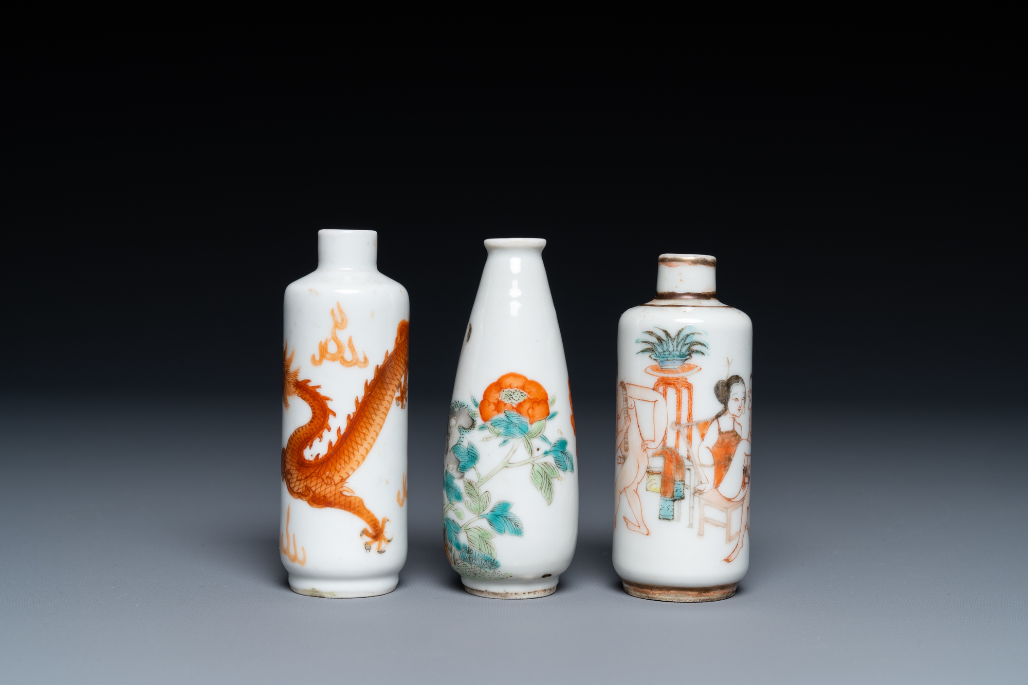 Three Chinese iron red and famille rose snuff bottles incl. one with an erotical subject, 19th C. - Image 2 of 6