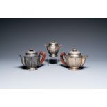 Two Vietnamese silver teapots and a sugar bowl and cover, marked Donghung, ca. 1900