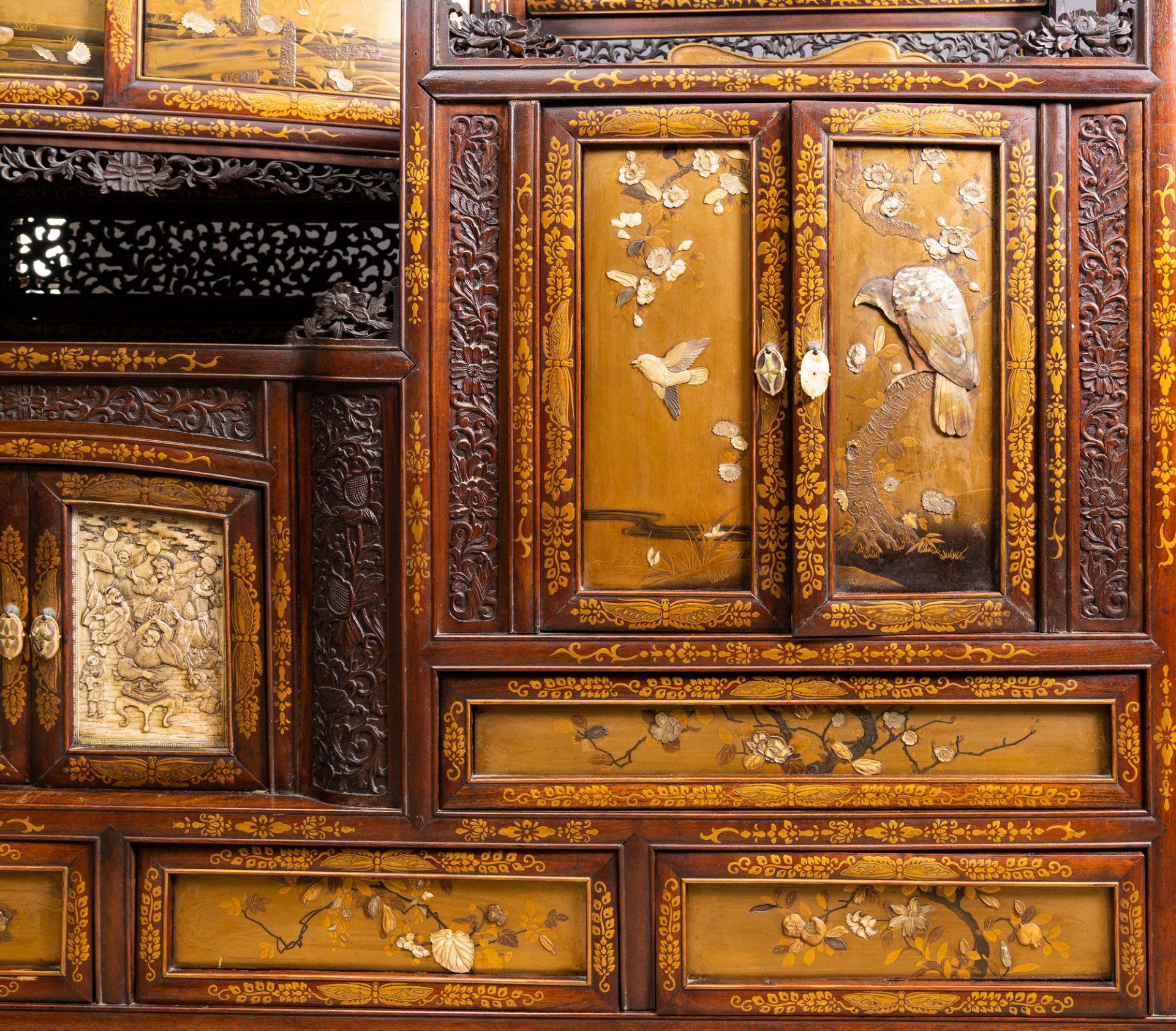 A Japanese 'chigaidansu' gilt-lacquered wood cabinet with finely carved ivory insets, Meiji, 19th C. - Image 6 of 15