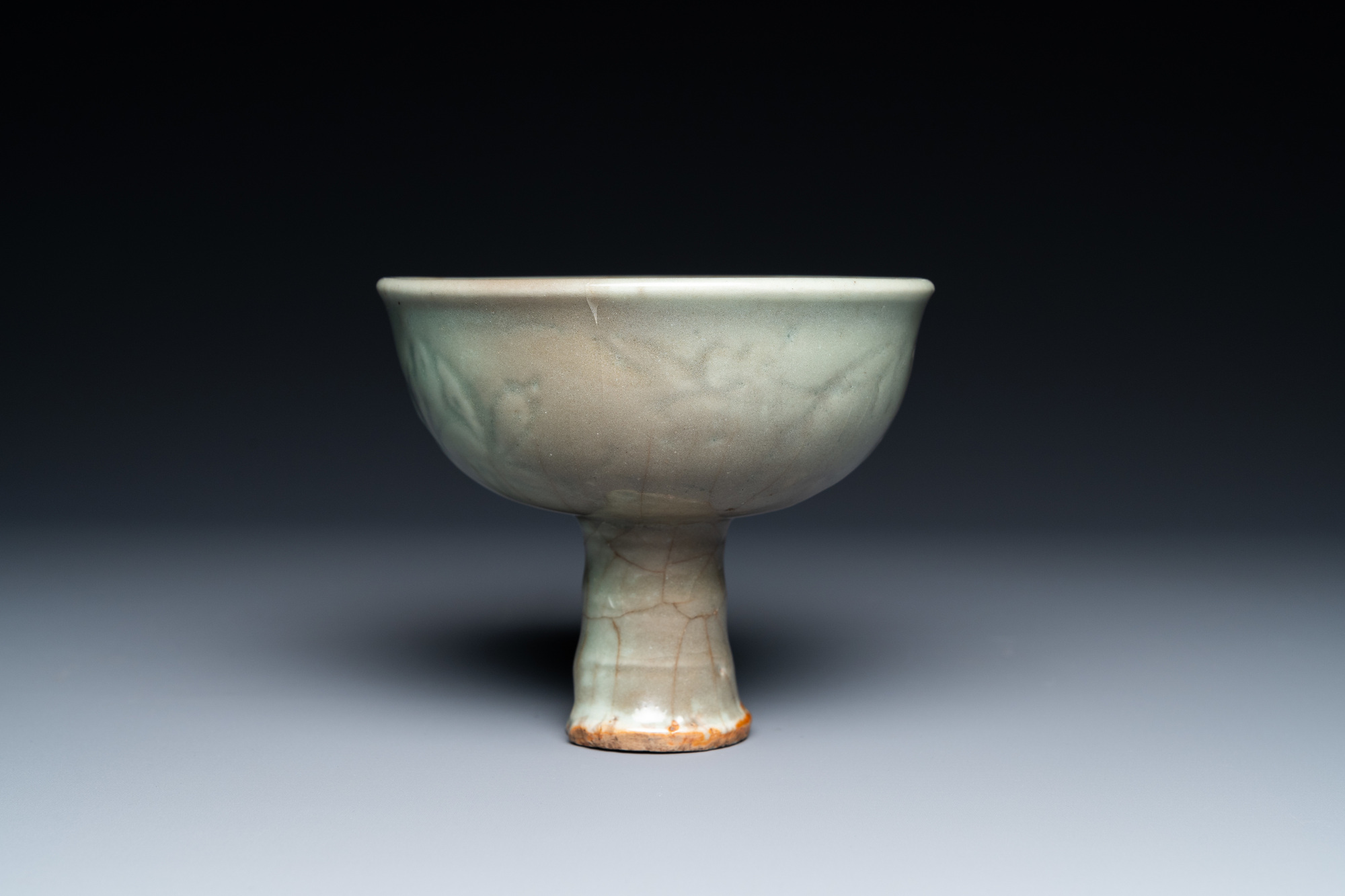 A Chinese Longquan celadon stem cup with underglaze design, Ming - Image 4 of 7