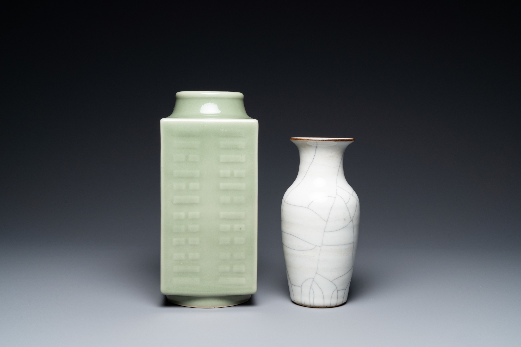 A Chinese celadon 'cong' vase with trigrams and a crackle-glazed vase, 19/20th C. - Image 2 of 7