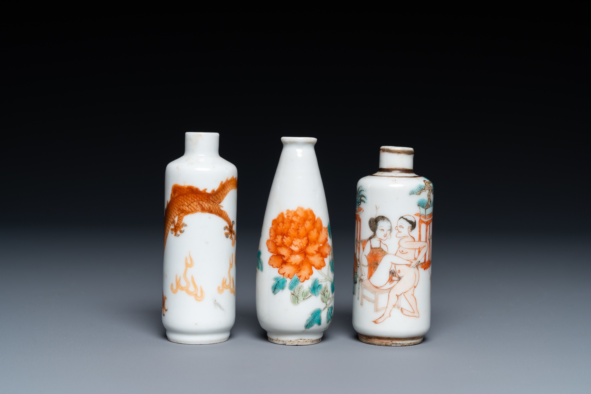 Three Chinese iron red and famille rose snuff bottles incl. one with an erotical subject, 19th C. - Image 3 of 6