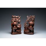 A pair of Chinese wood carvings, 19th C.