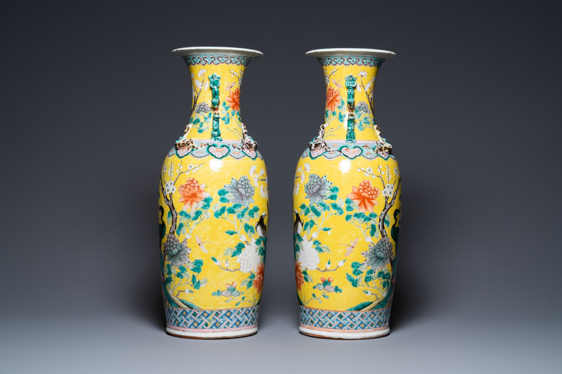 A pair of Chinese yellow-ground famille rose vases, 19th C. - Image 4 of 6