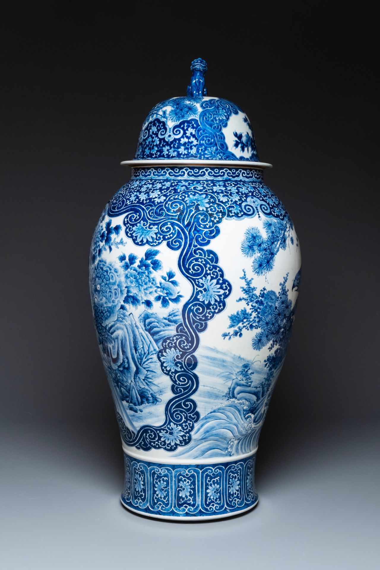 A massive Japanese blue and white Seto vase and cover with shishi and an eagle, Meiji, 19th C. - Image 4 of 6