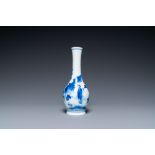 A Chinese blue and white bottle vase with a lady and her servant in a landscape, Transitional period