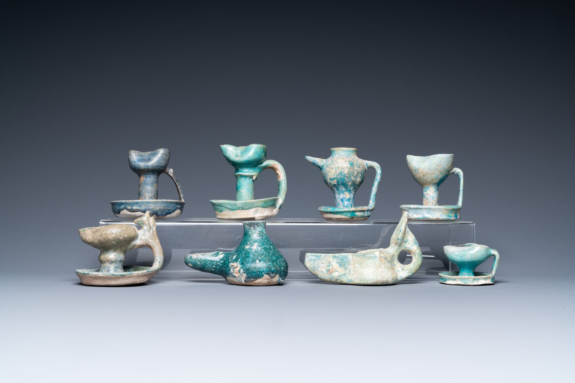 Eight turquoise-glazed oil lamps, Middle-East, 13th C. and later - Image 2 of 7