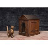 A French wooden doghouse with a gilt wooden dog, 18/19th C.