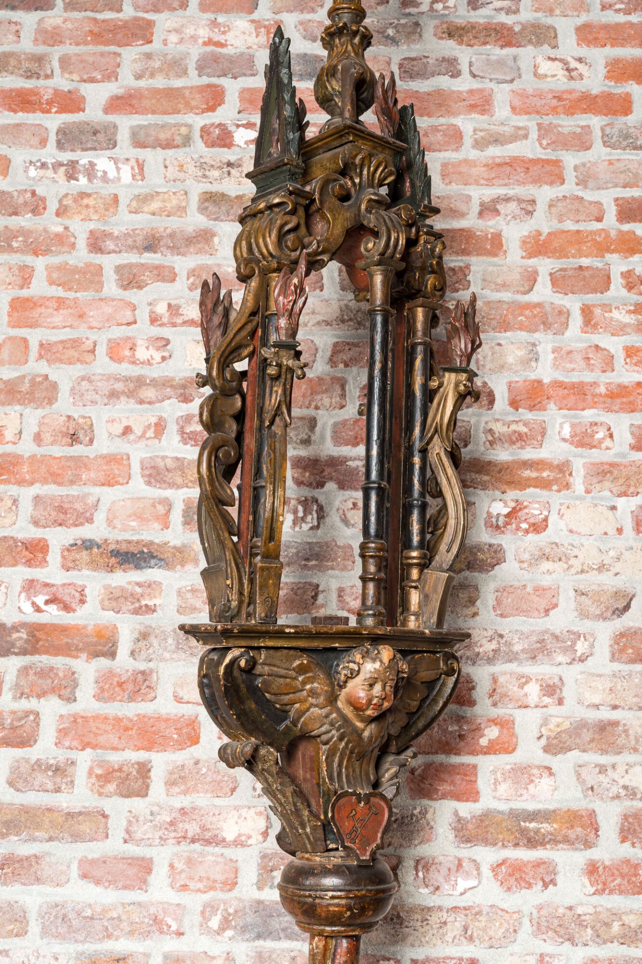 A pair of large polychromed and gilt processional torches with cherub heads, 18th C. - Image 5 of 6