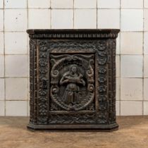 A small dark-patinated wooden corner cabinet with a shepherdess, 17th C. and later