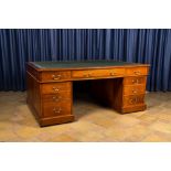 A Hobbs & Co Regency Lever London mahogany partners desk with a leather writing surface, ca. 1900