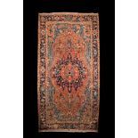 A Persian Heriz rug with floral design and geometric motifs, wool on cotton, 1st half 20th C.