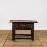 A Spanish wooden table with one drawer, 17/18th C.