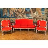 A partly gilt wooden sofa and four armchairs with red velvet upholstery, 18/19th C.